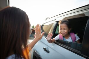 parent waving 2 300x200